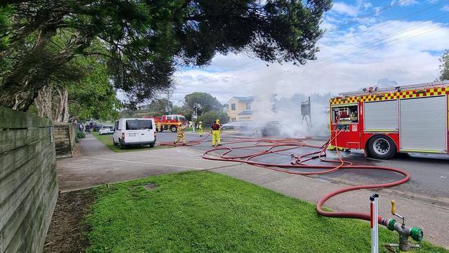 Fireys are on the scene of a car fire on Church St in Cowes. Picture: Brittany Carlson