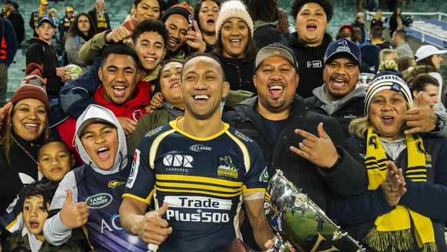 Co-captain Christian Lealiifano of the Brumbies poses for a portrait with his family.