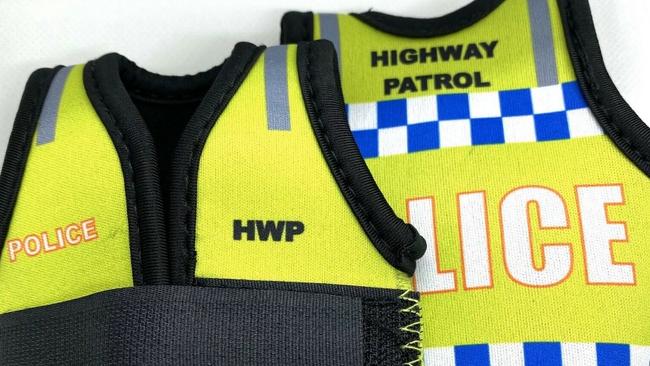 Stubby holders done up as highway patrol vests.