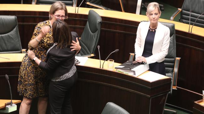 Greens leader Cassy O'Connor, left, and Labor's Ella Haddad celebrate the passage of birth certificate legislation in Tasmani’s state parliament.