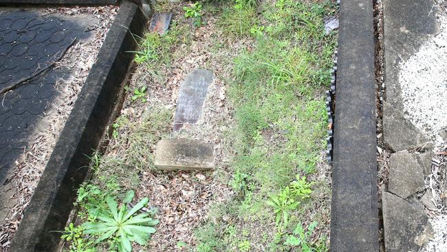 The sunken headstone of Fred Lawrence, 15, who drowned in the 1901 Roxana disaster. Picture: Steve Pohlner