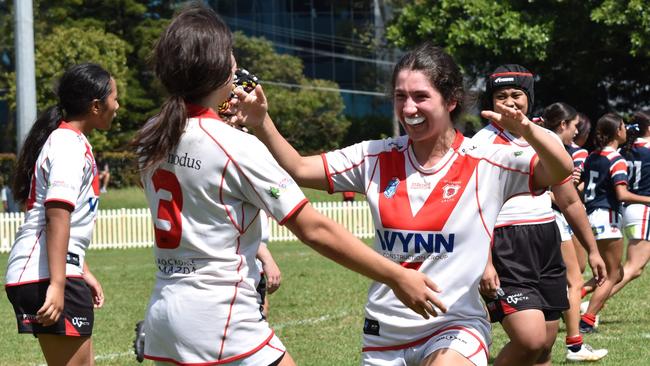 Taylah El-Ters (right) celebrates with Emma Warr. Picture: Sean Teuma. Lisa Fiaola Cup trial, St George Dragons vs Sydney Roosters at Mascot Oval, 13 January 2024.