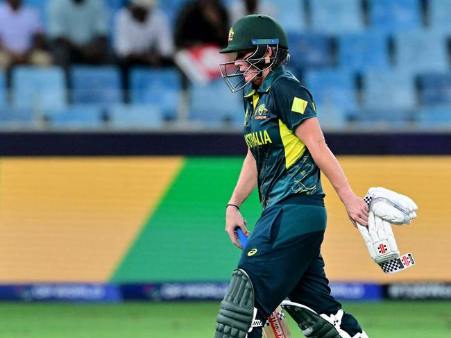 Australia's Beth Mooney walks back to the pavilion after her dismissal during the ICC Women's T20 World Cup cricket semi-final match between Australia and South Africa at the Dubai International Cricket Stadium in Dubai on October 17, 2024. (Photo by Giuseppe CACACE / AFP)