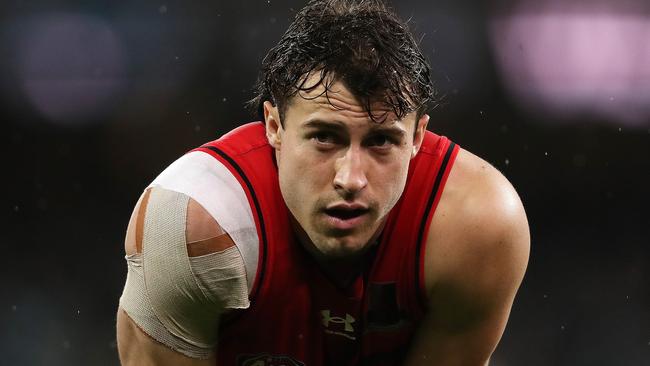 Essendon midfielder Andrew McGrath is out of contract and making the club wait.