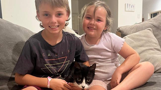 Squirt, with Kane and Billie Starkey, came home after a year away from her family.