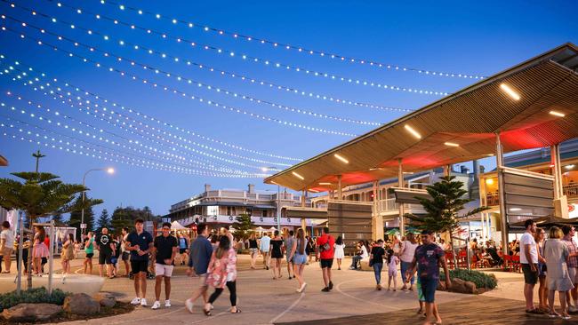 Henley Beach goers walking through Henley Square. Picture: Russell Millard