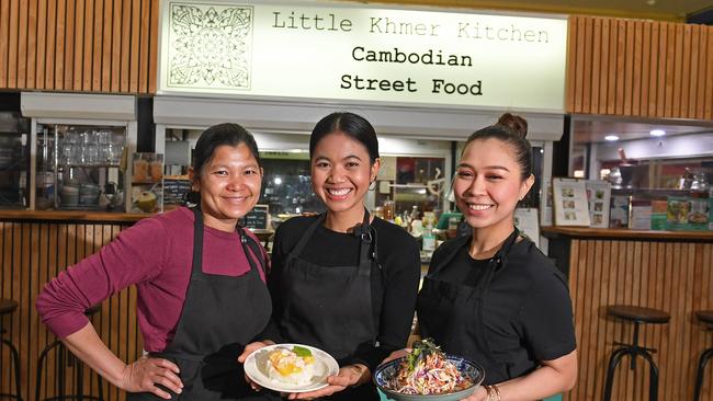 Little Khmer Kitchen owner SreymomLund (centre) with staff Naret Duk and Phea Kha in the Central Market Arcade. Picture: Tom Huntley