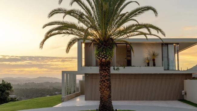 When buyers enter the driveway of 108 Panorama Drive, Doonan, they are graced with electric gates and a statement date palm in the circular driveway.Â 