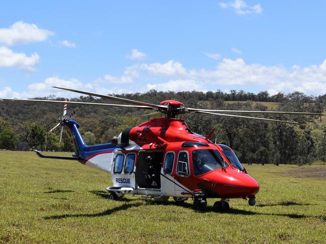 Emergency-response crews from Ingham Police, Queensland Fire Service, Rural Fire Service Queensland, Queensland Ambulance Service and a Queensland Air Ambulance rescue helicopter came to the aid of an 18-year-old Hinchinbrook woman seriously injured in a car accident on Mount Fox Road this morning. Picture: CAMERON BATES