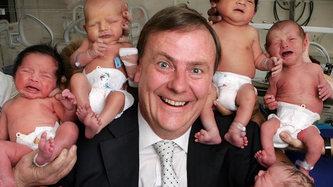 Baby bonus story. National Treasurer Peter Costello with new born babies at Royal Women's Hospital. Digital image.  HS25