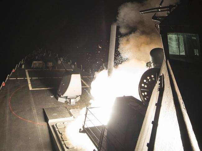 The USS Ross (DDG 71) fires a tomahawk land attack missile from the Mediterranean Sea. Picture: Mass Communication Specialist 3rd Class Robert S. Price/U.S. Navy via AP