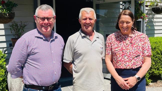 Senator Murray Watt, business owner Richard Adams and Gilmore federal Labor MP Fiona Phillips, right, with Mogo Village Business Chamber in happier times.