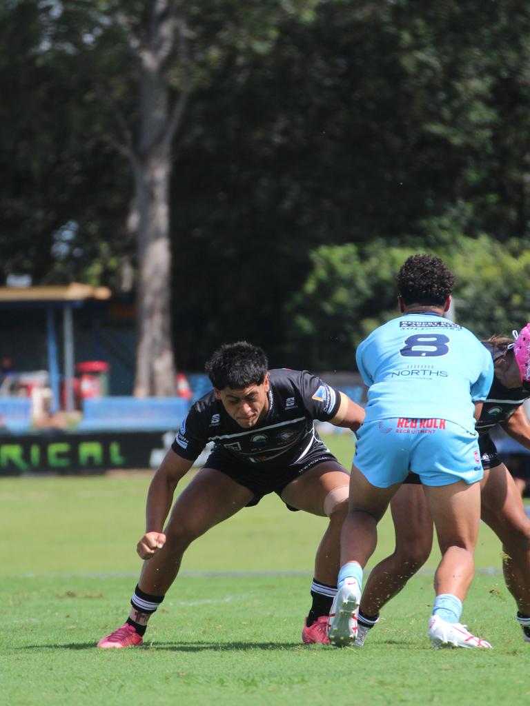 Dyer Akauola rucking the ball up (No.8). Connell Cup action between Tweed and Norths.