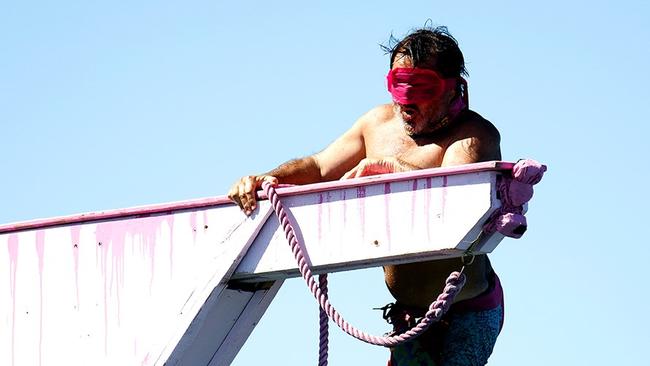 Clarke-Jones performs a challenge on the set of Survivor Australia. Picture: Network 10