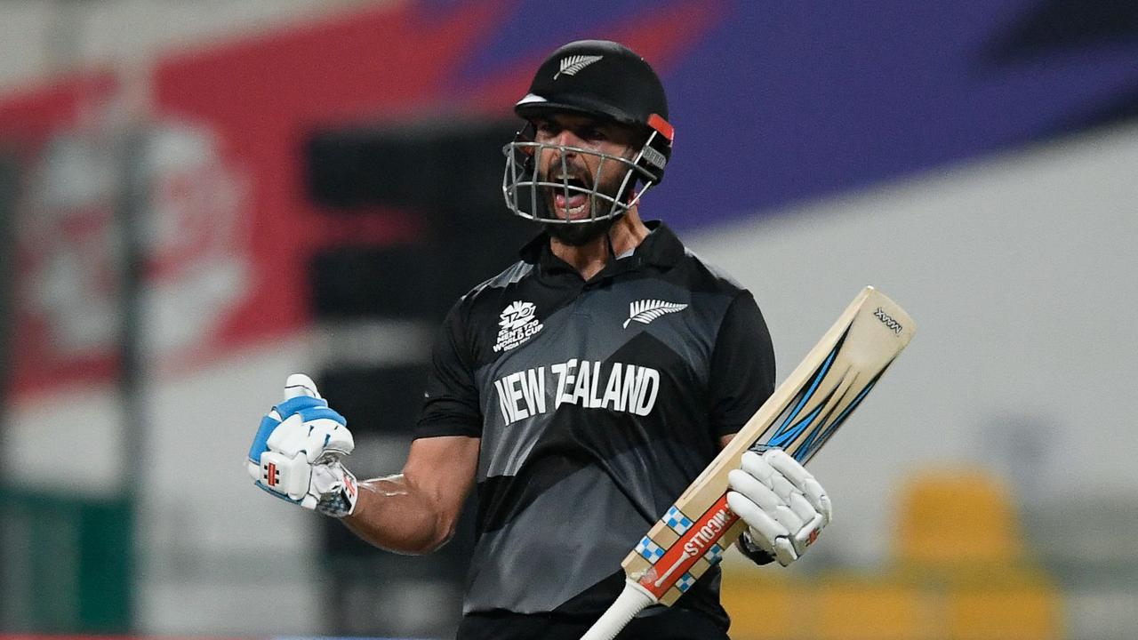 Daryl Mitchell celebrates hitting the winning runs to advance New Zealand to the T20 World Cup final. Picture: AFP
