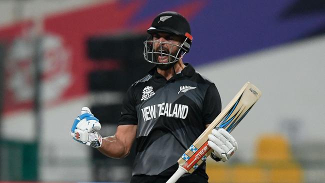 Daryl Mitchell celebrates hitting the winning runs to advance New Zealand to the T20 World Cup final. Picture: AFP