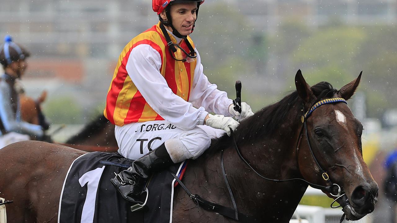 Tim Clark returns to scale on Peltzer after winning the Bondi Stakes at Randwick. Picture: Getty Images