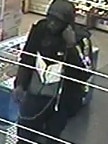 A person police wish to speak to in relation to a service station robbery.