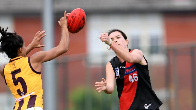 Chantella Perera pressures Lauren Ahrens. Picture: Andy Brownbill