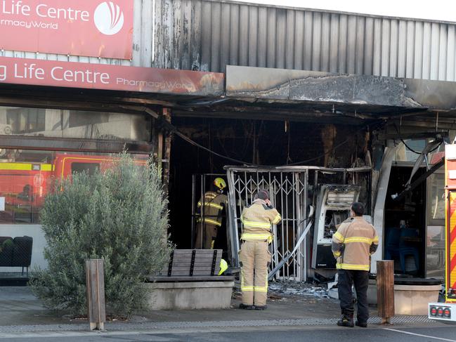 Police and fire crews at a tobacco store on Bonwick Street Fawkner that was gutted in September. Picture: Andrew Henshaw