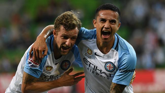 Nicolas Colazo (left) and Tim Cahill of Melbourne City celebrate Cahill’s header.