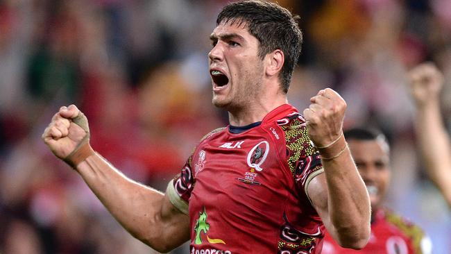 BRISBANE, AUSTRALIA - MAY 30: Rob Simmons of the Reds celebrates victory after the round 16 Super Rugby match between the Reds and the Highlanders at Suncorp Stadium on May 30, 2014 in Brisbane, Australia. (Photo by Bradley Kanaris/Getty Images)