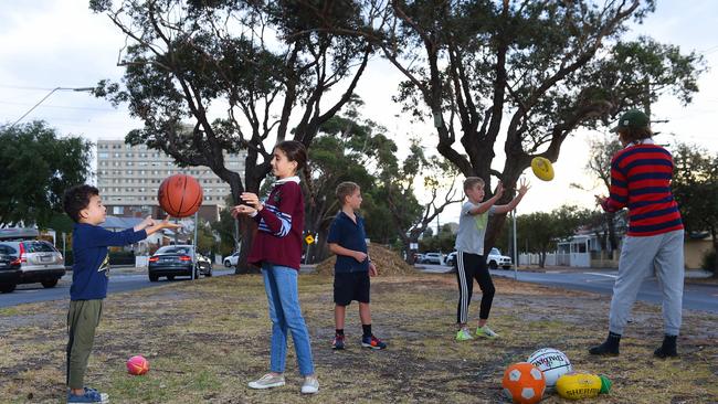 Lorenzo, 5, Silvana, 9, Samuel, 9, Freddie, 11, and Harry, 14, like to play on the median strip. Picture: Josie Hayden