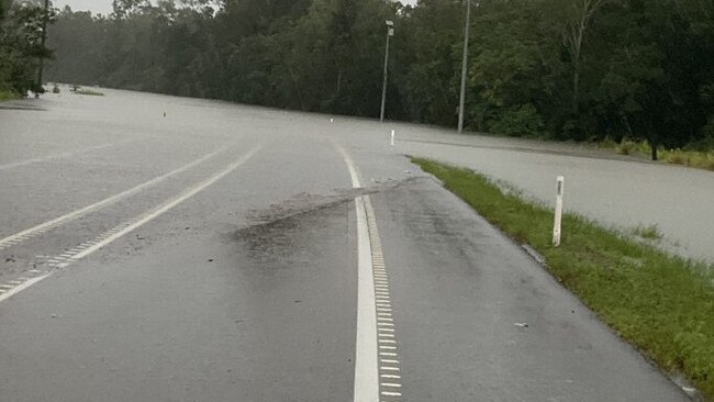 Water over the road due to flooding on the Bruce Hwy between Tully and Cardwell. File photo. Picture: QPS