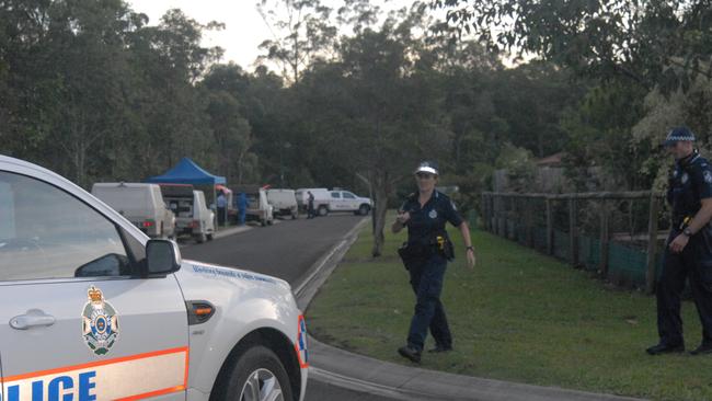 Police guard the scene at Allan Ave, Glasshouse Mountains where a couple was found dead in a bedroom. Picture: Megan Mackander