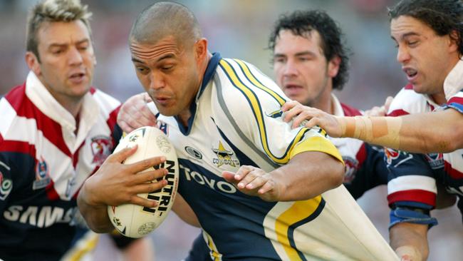 Paul Rauhihi on the charge for the Cowboys against the Roosters in 2004.