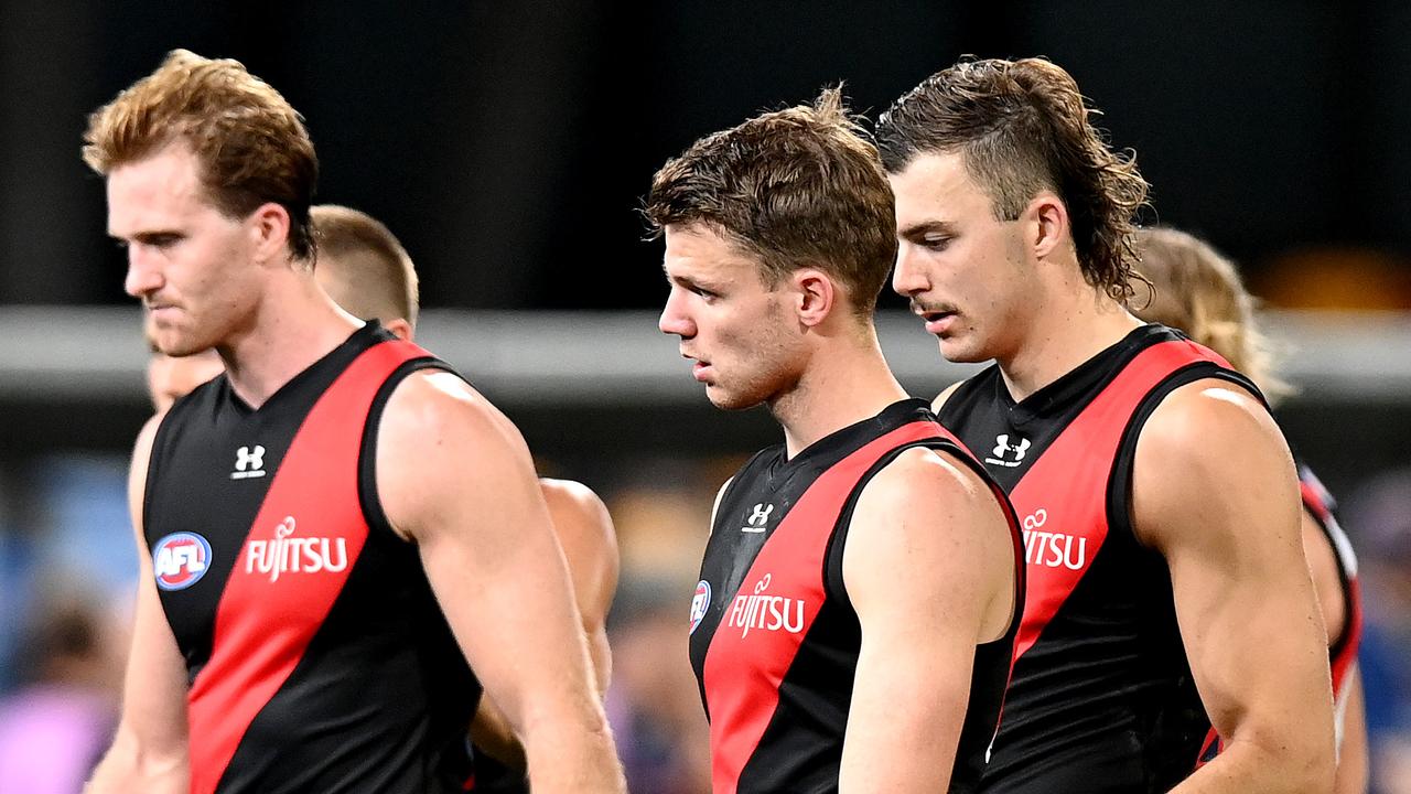 AFL player salaries Essendon backflips on pay cut decision; players to