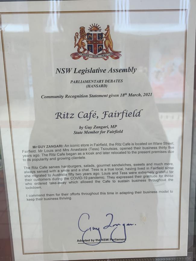 A “Community Recognition Statement” certificate stuck on the counter of the Ritz Cafe in Fairfield.