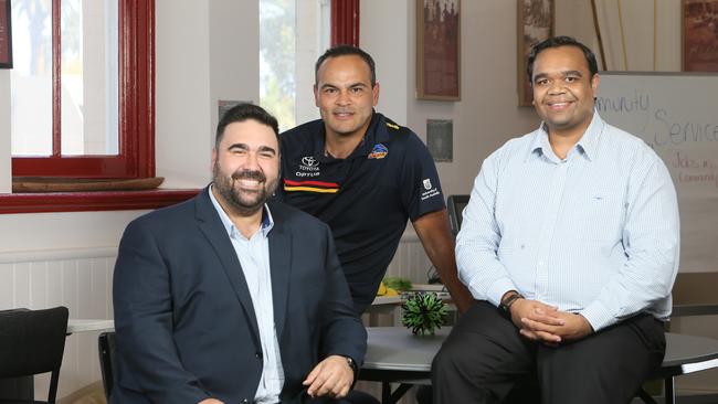 Jeremy Johncock from the Crows (middle) Marius Liddle and Brenz Saunders from Tauondi Aboriginal College are involved in a new educational program to encourage more indigenous people into the IT sector. Picture: Emma Brasier