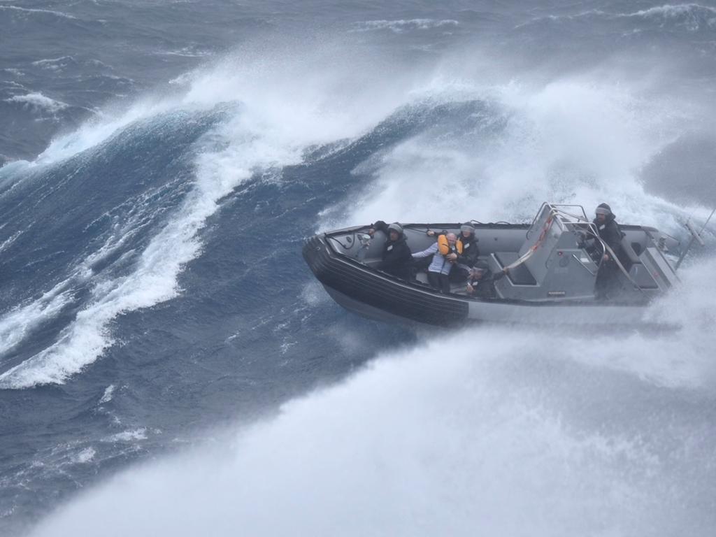 A sailor is rescued from a catamaran near the Northland city of Whangarei. Picture: New Zealand Defence Force / AFP