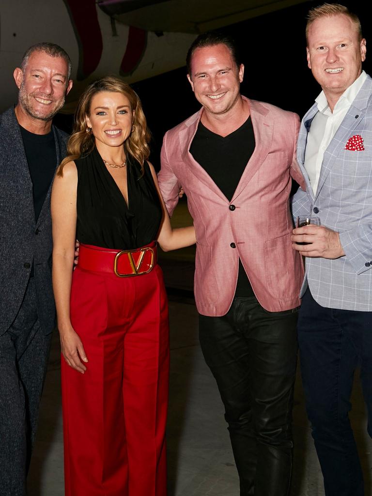 Grant Pearce, Dannii Minogue, Stephen Howard and David Lutteral at the launch of Virgin Australia's new business-class menu in the Virgin hangar at Brisbane Airport. Picture: Carly Ravenhall