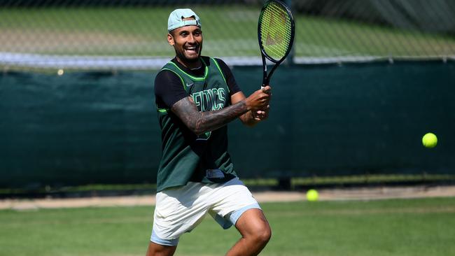 Nick Kyrgios trains on a practice court ahead of the Wimbledon final on Sunday