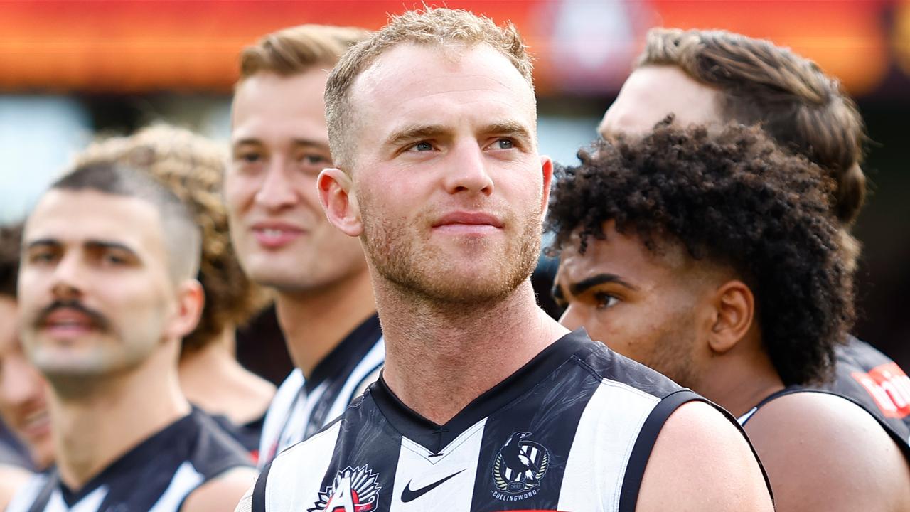 MELBOURNE, AUSTRALIA - APRIL 25: Tom Mitchell of the Magpies looks on during the Anzac Day observance ceremony during the 2023 AFL Round 06 match between the Collingwood Magpies and the Essendon Bombers at the Melbourne Cricket Ground on April 25, 2023 in Melbourne, Australia. (Photo by Dylan Burns/AFL Photos via Getty Images)