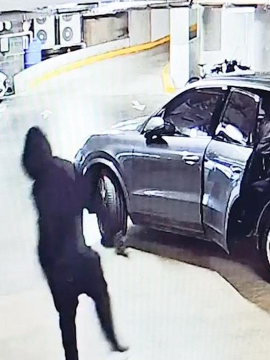 CCTV released by police shows a gunman jumping into a car after Moradian was shot.