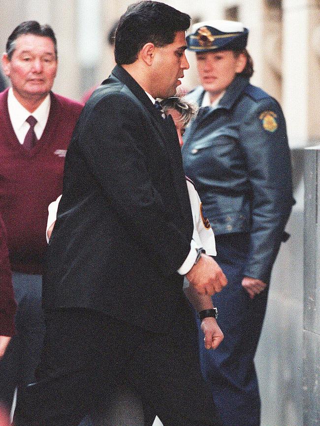 Tony Kellisar is escorted into during his murder trial. Picture: Simon Dallinger