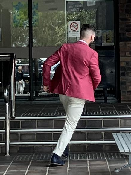 Samuel Messina running past the media and into Port Kembla Courthouse in November, 2022. Picture: Dylan Arvela
