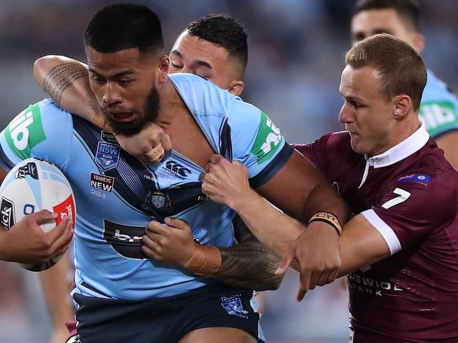 SYDNEY, AUSTRALIA - NOVEMBER 11:  Payne Haas of the Blues is tackled during game two of the 2020 State of Origin series between the New South Wales Blues and the Queensland Maroons at ANZ Stadium on November 11, 2020 in Sydney, Australia. (Photo by Mark Kolbe/Getty Images)