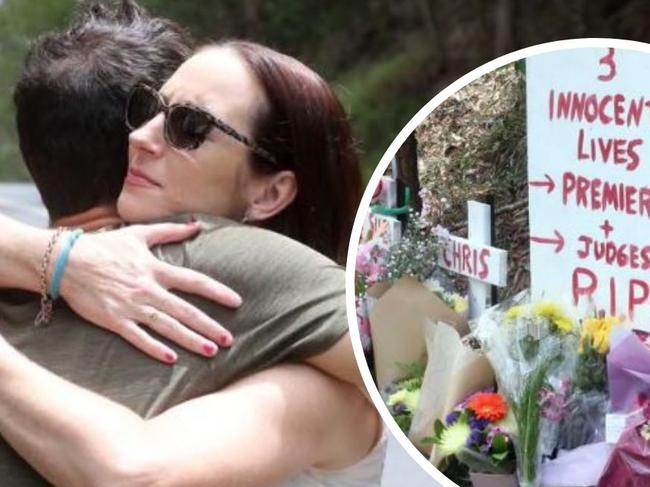 Claudine Snow hugging a community member at her family's roadside memorial.