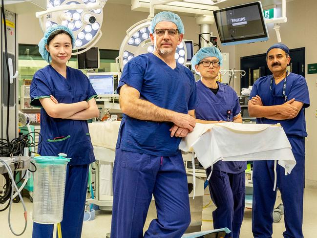 Surgeon Marcos Perin and his team Dr Sarah Qi, Dr. Dixon Woon and Dr. Jayapadman Bhaskar at The Austin Hospital. Picture: Jake Nowakowski