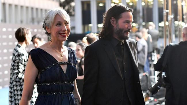 Grant beamed beside Reeves. Picture: Getty Images.