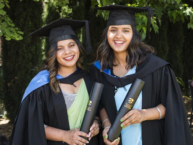 Bachelor of Nursing graduates Anusha Chaudhary (left) and Santoshi Dhungana at a UniSQ graduation ceremony at Empire Theatres, Tuesday, October 31, 2023. Picture: Kevin Farmer