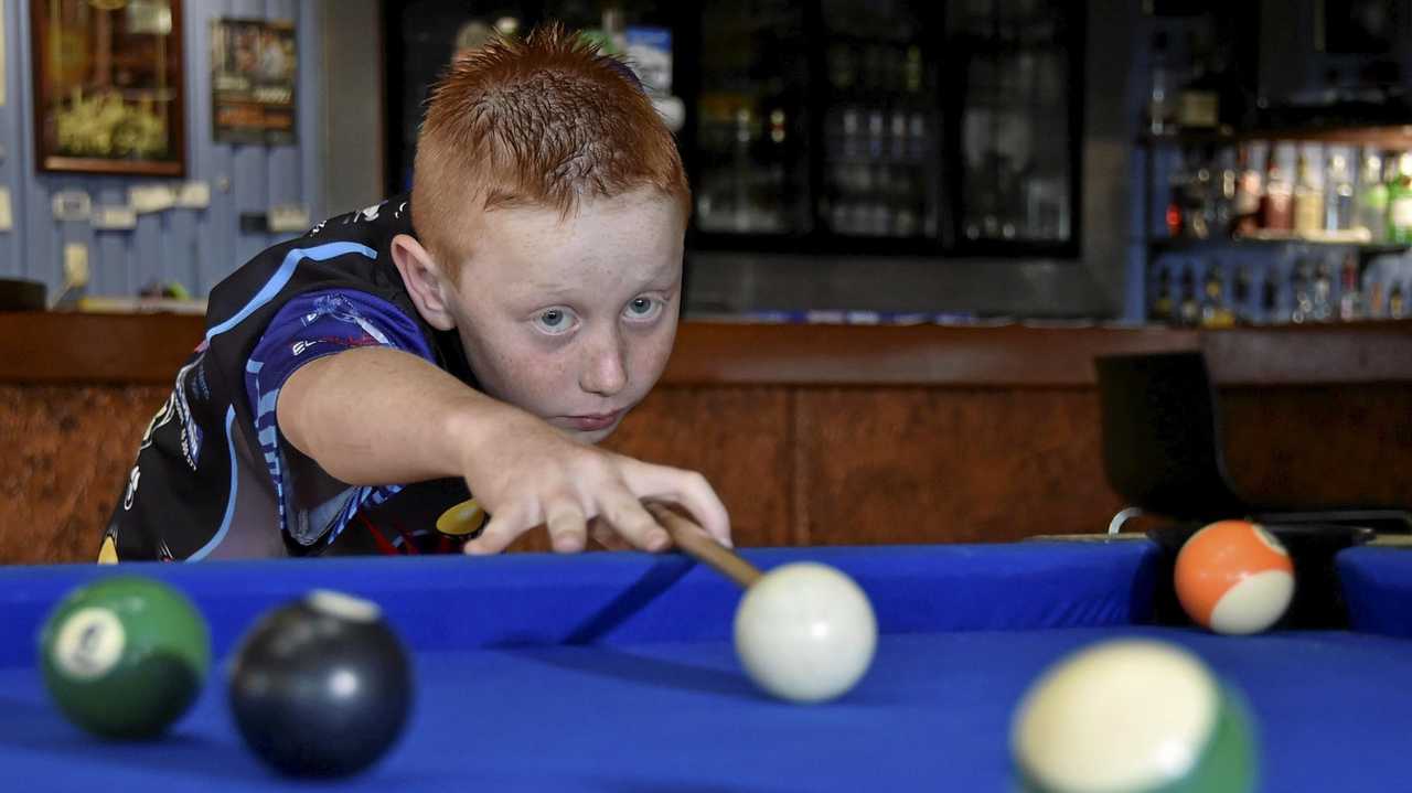 LINE THEM UP: Toowoomba's Callum Hensler, 8, has been named in the Queensland eight ball team that will compete in Tasmania in January. Picture: Bev Lacey