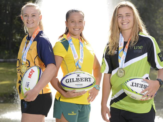 Parker (left), with Page McGregor and Hannah Southwell as Comm Games Youth medallists and Uni 7s players.