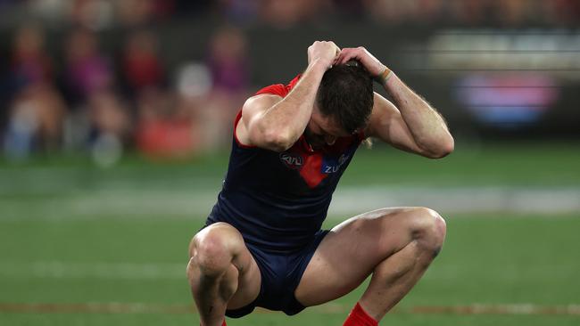 MELBOURNE, AUSTRALIA - SEPTEMBER 15: Joel Smith of the Demons is dejected after the Demons were defeated by the Blues during the AFL First Semi Final match between Melbourne Demons and Carlton Blues at Melbourne Cricket Ground, on September 15, 2023, in Melbourne, Australia. (Photo by Robert Cianflone/Getty Images)