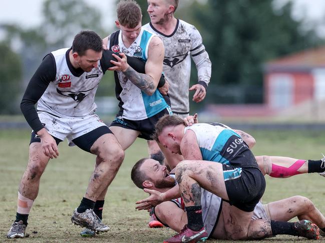 EDFL: Harley Short of Roxburgh Park and Hillside’s Lucas Failli tussle. Picture: George Sal