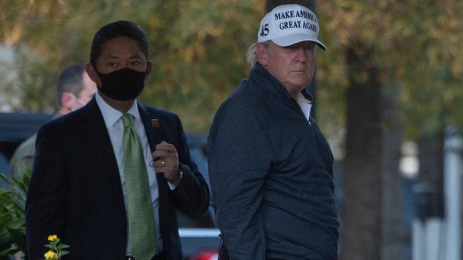 Donald Trump returns to the White House from playing golf in Washington on Sunday. Picture: AFP